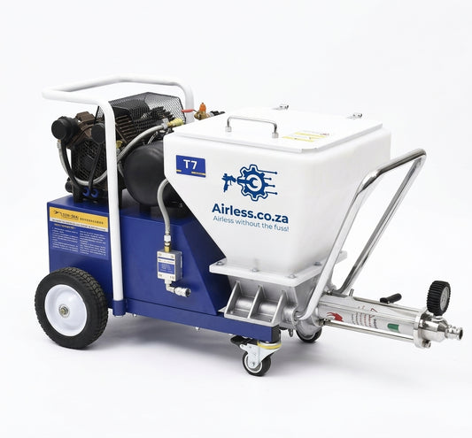 An industrial airless paint sprayer machine on a white background. The machine features a blue and white body with a large white hopper container, a black engine, and a chrome metal push handle and spray nozzle attachment.